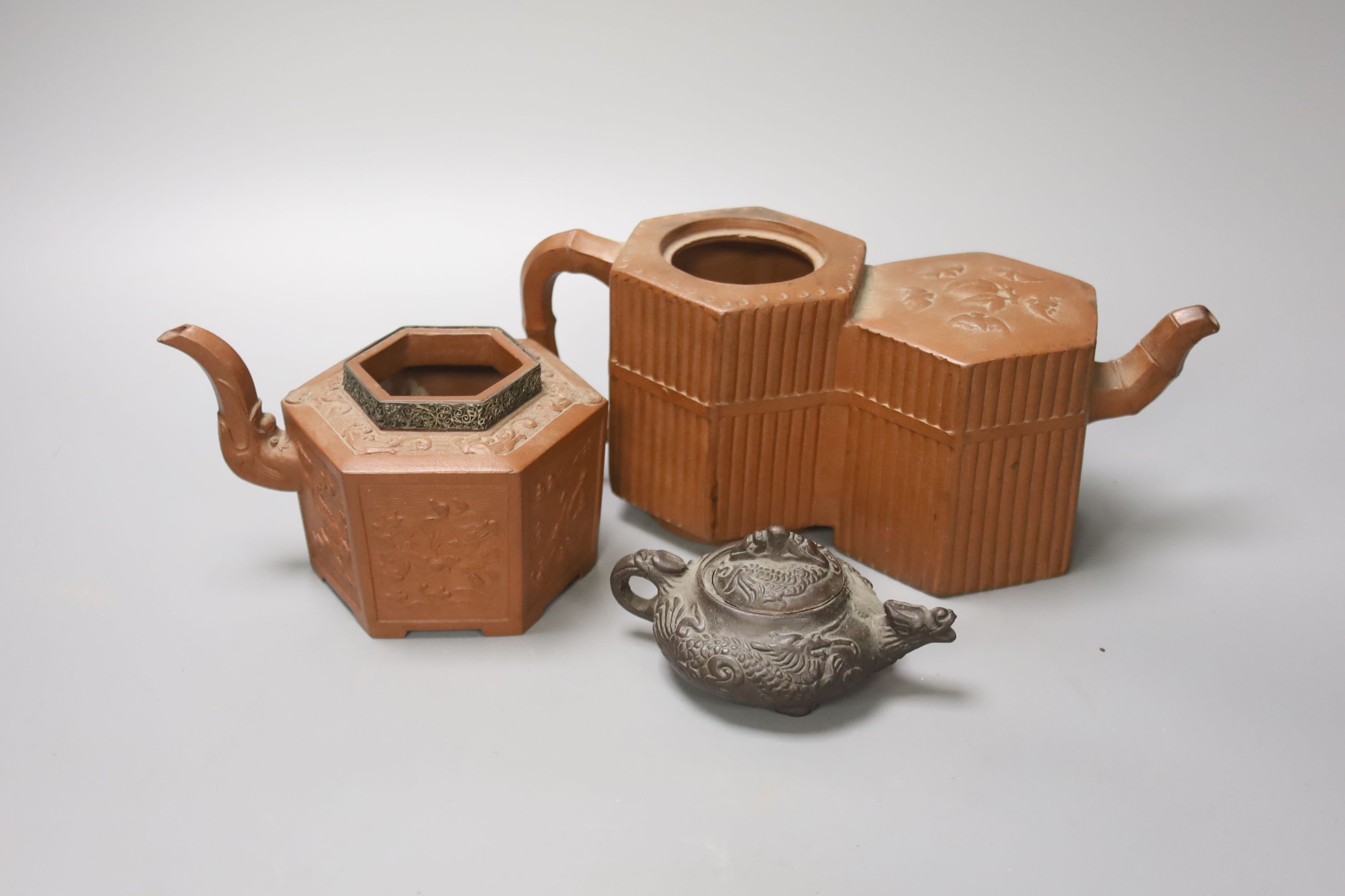 Two 19th century Chinese Yixing teapots (no covers) and a later Yixing miniature teapot